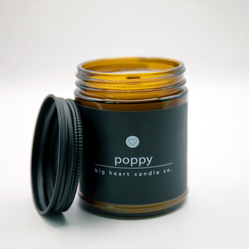 poppy scented candle (jasmine, pear, apricot, rose notes)