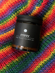 poppy scented candle (jasmine, pear, apricot, rose notes)